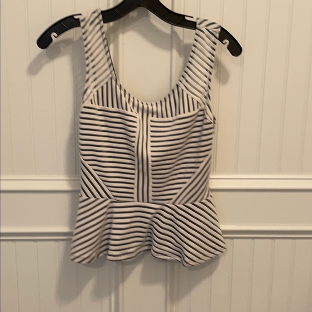 Moving sale! Black and white Bebe peplum top